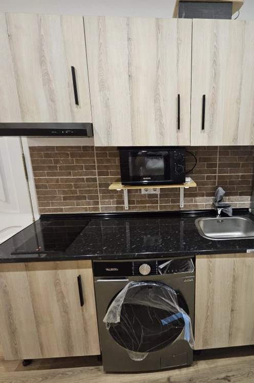 Restauración de cocina con lavadora